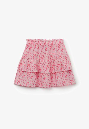 Rosa gestufter Rock mit elastischem Bund, bedeckt mit kleinem roten und weißen Blumenmuster.