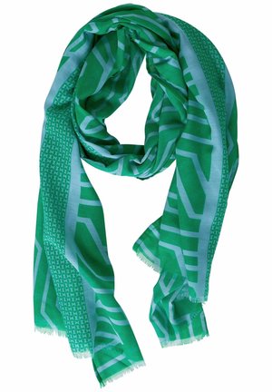Green and light blue lightweight scarf with geometric and striped patterns and fringed edges, loosely looped.
