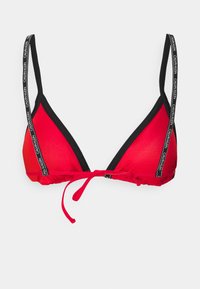 Top in bikini triangolare rosso con accenti neri e spalline regolabili, caratterizzato dal marchio "Calvin Klein". Tessuto morbido e liscio con chiusura a nodo.