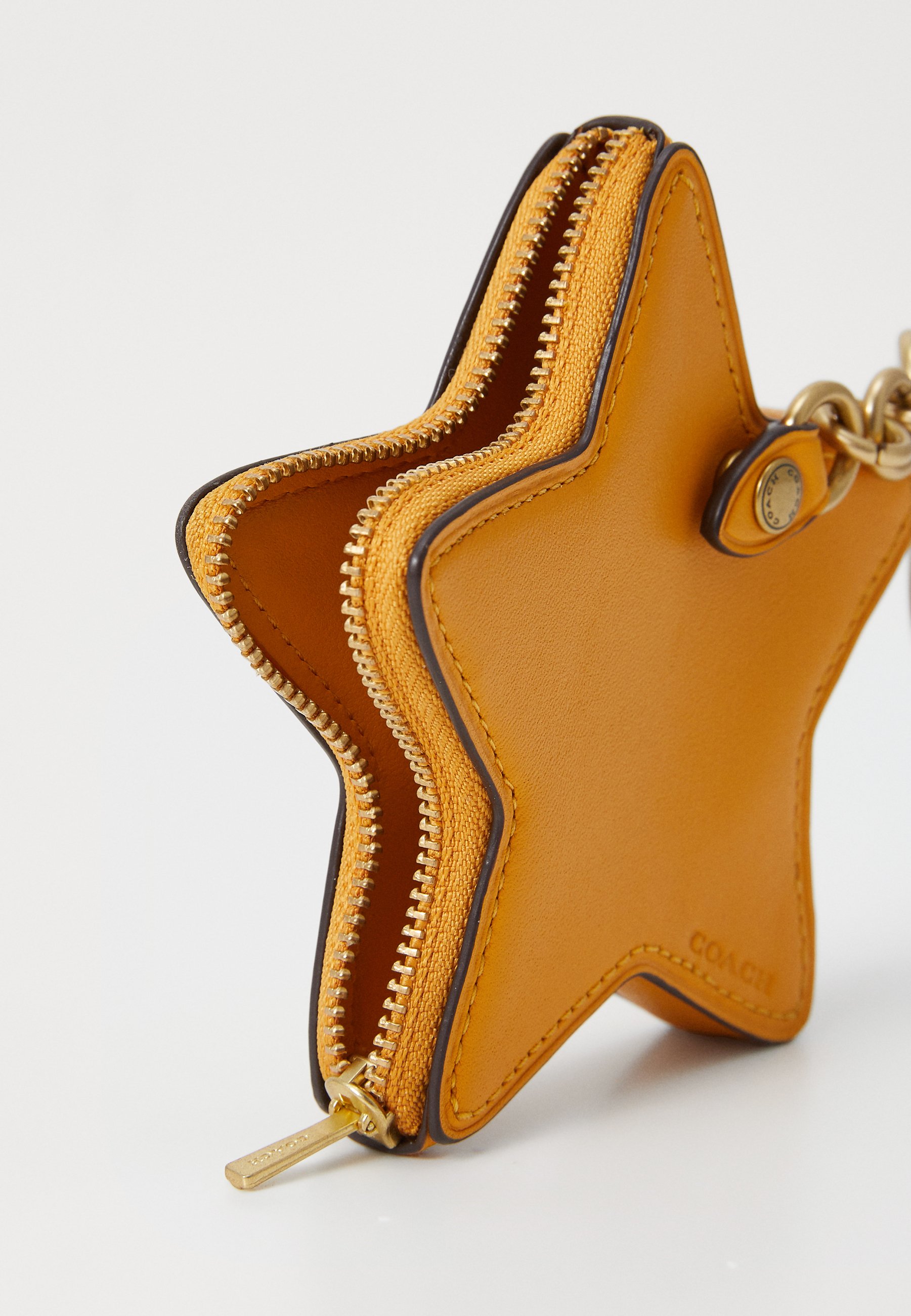 【COACH】GLOVETANNED STAR COIN PURSE 星型コインケース/yellow Coach Glovetanned Leather Star Coin Purse | Shopbop
