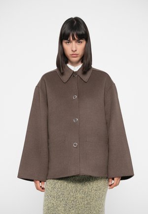 Brown wool-blend jacket with a collared neckline, front buttons, and two side pockets. Features wide sleeves and a relaxed fit.