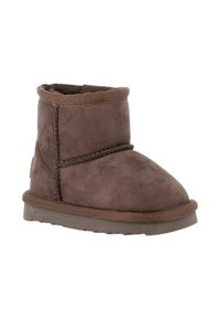 Stivale alla caviglia in suede marrone con accenti cuciti, punta tonda e suola piatta in gomma. Tessuto morbido con apertura superiore a onda.