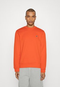 Lacoste UNISEX - Sudadera - sunrise