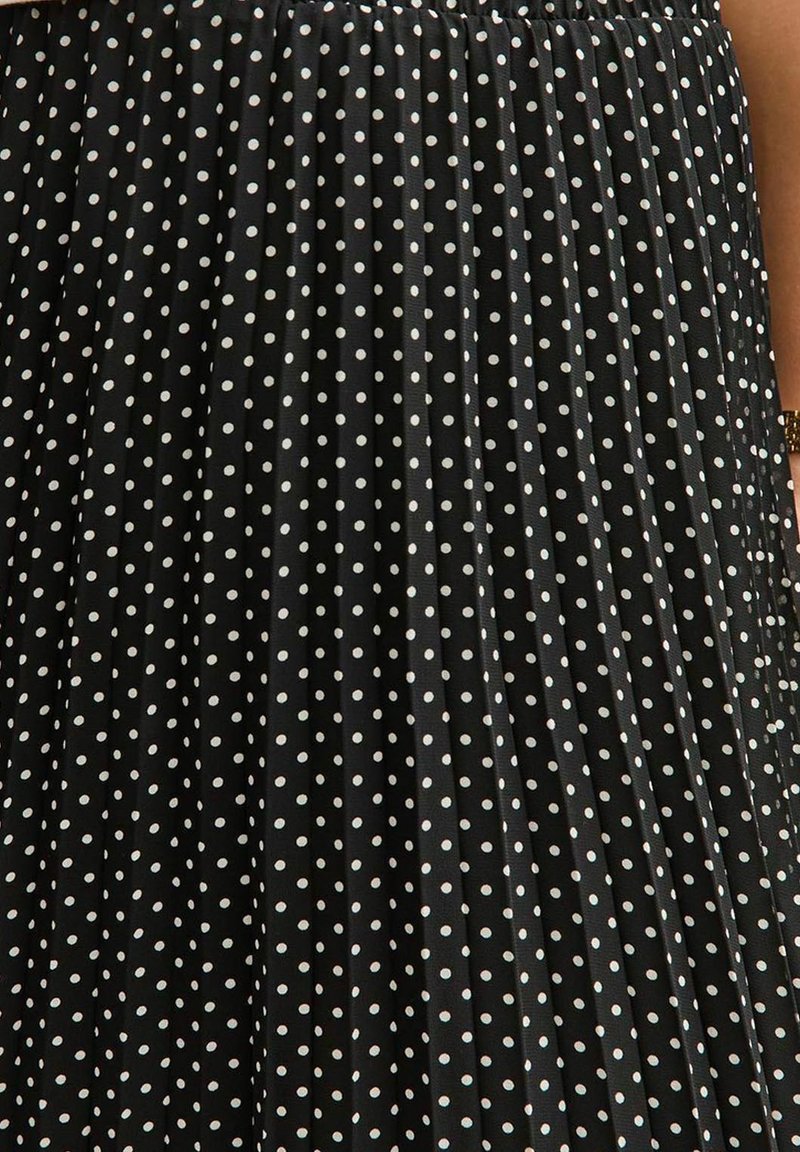 The Barbara Midi Skirt in black Silk with white polka dots – Mister k
