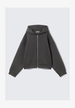 Gray zip-up hoodie made from soft fabric with a relaxed fit, large front pockets, and a drawstring hood. Simple design, no patterns.