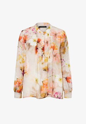 Long-sleeve blouse with soft peach, white, and yellow floral pattern, mandarin collar, button placket, and pleated front detail.