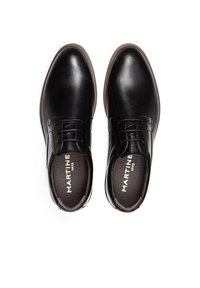 Chaussures habillées en cuir noir avec une finition lisse, bout rond et design à lacets. L'intérieur présente un lettrage de marque embossé.