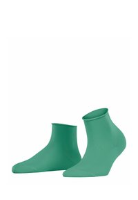 Grüne Knöchelsocken mit einer glatten, dehnbaren Textur und einem körpernahen Design, die eine abgerundete Zehenpartie und eine mittelhohe Bündchenhöhe aufweisen.