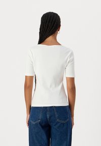 Calvin Klein Jeans V NECK TEE - Osnovna majica kratkih rukava - bright white