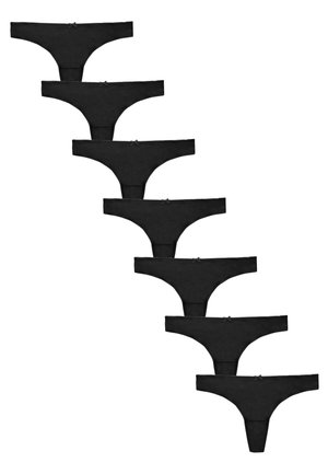 Sette perizoma neri da donna disposti diagonalmente, ciascuno con un piccolo fiocco decorativo al centro della vita.