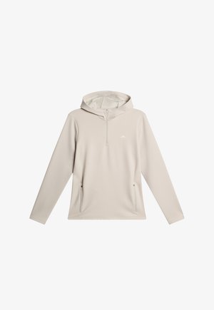 Pullover con cappuccio beige chiaro, con zip a metà frontale, due tasche laterali e un logo discreto sul petto. Texture liscia, design casual.