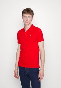 Tommy Jeans SLIM PLACKET - Polo - deep crimson