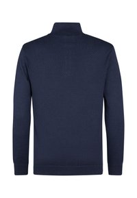 Maglione pullover blu navy con un motivo zigzag testurizzato, colletto e polsini a costine. Realizzato in morbido materiale a maglia, con maniche lunghe.