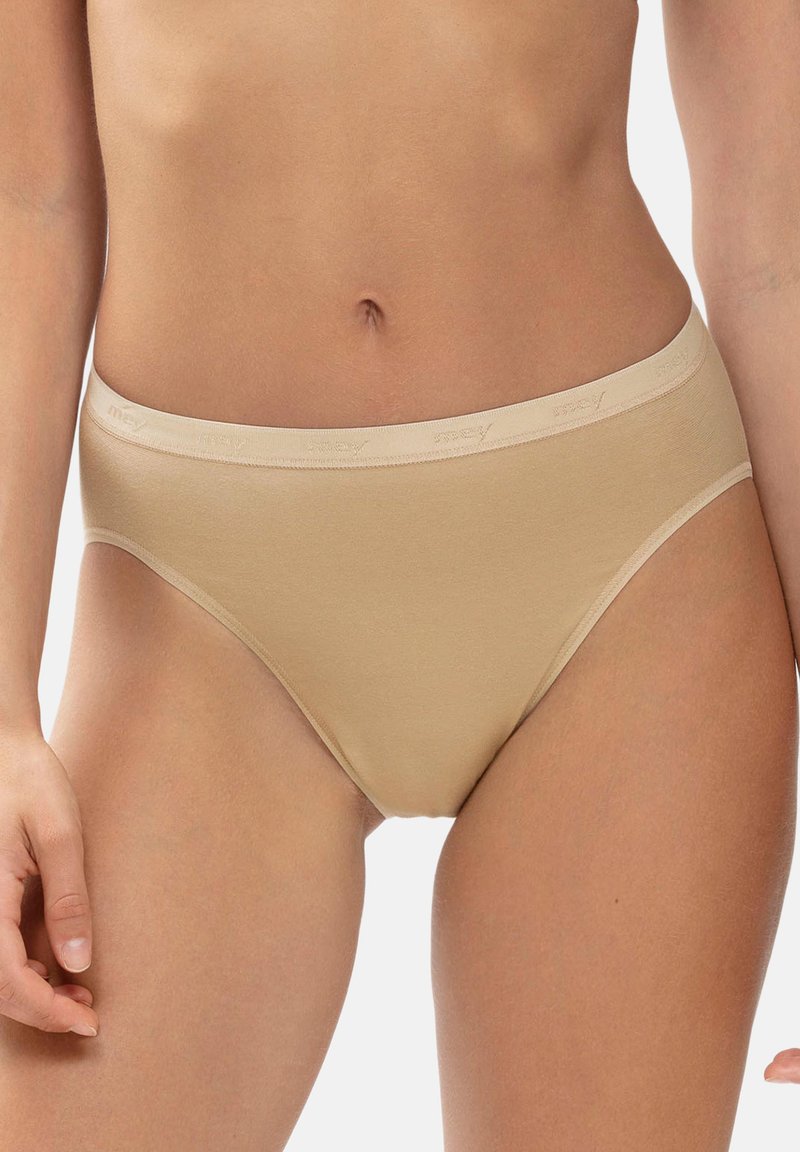Beige bomuldsbrief med en glat overflade og en blød, elastisk talje, der har brandnavnet. Klassisk snit med middel dækning.
