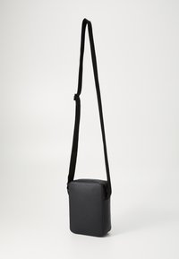 Tommy Hilfiger MONOGRAM MINI REPORTER UNISEX - Umhängetasche - black