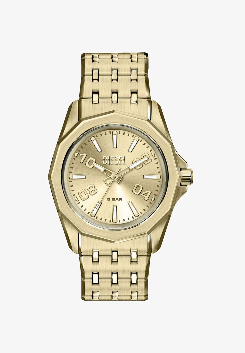 Montre Diesel ton or avec lunette octogonale, index numériques et bâtons pour les heures, bracelet en maillons métalliques, et trois aiguilles indiquant 10:09:36.