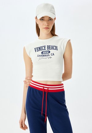 T-shirt med print - beige