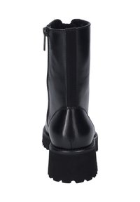 Black leather ankle boot with a chunky rubber sole, featured zipper closure, and elastic side panels for flexibility; smooth finish.