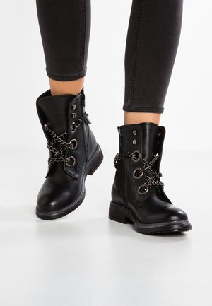 Botines camperos - black