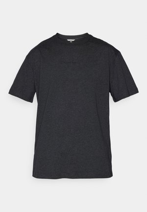 Schwarzes T-Shirt mit Rundhalsausschnitt, hergestellt aus weicher Baumwolle und mit kurzenÄrmeln. Mit einem dezenten Logo in der Mitte über der Brust. Glatte Textur.
