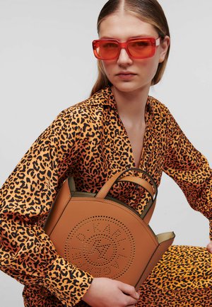 CIRCLE PERFORATED SMALL - Bolso de mano - brown