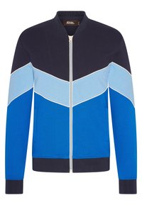 Blå bomberjacka med marinblå, ljusblå och himmelsblå färgblockering. Har dragkedjestängning, ribbade manschetter och sidofickor.