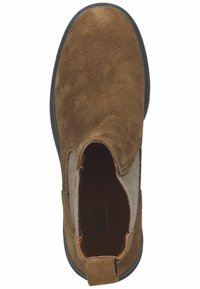 Braune Wildleder-Ankle Boots mit runder Zehenform, elastischen Seitenpaneelen und einem strukturierten grauen Stoffakzent. Schwarze Gummisohle.