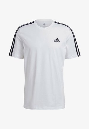 Camiseta blanca de manga corta de algodón, con diseño de tres rayas negras en los hombros y pequeño logotipo negro en el lado izquierdo del pecho.