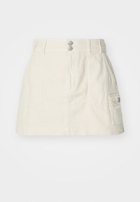 Béžová bavlněná mini sukně s dvěma předními kapsami, zapínáním na knoflík a rovním lemem. Vyznačuje se hladkou strukturou a pohodlným designem.