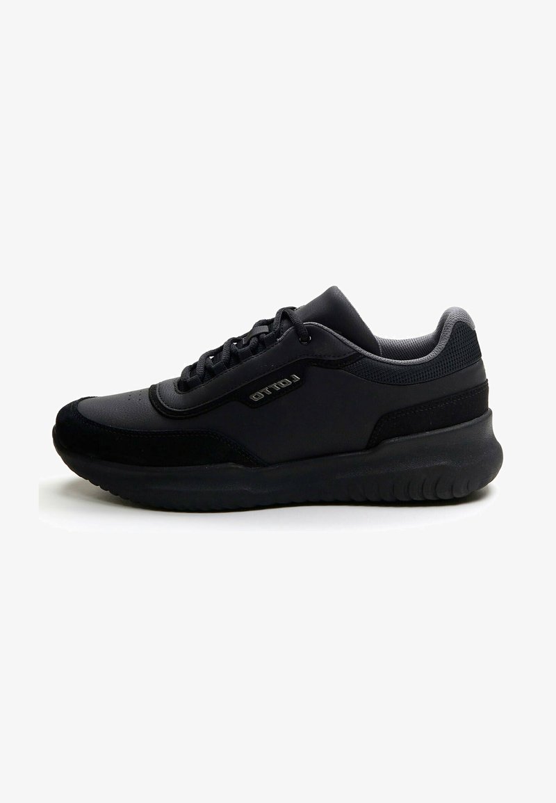 Black athletic shoe with a smooth, synthetic upper, lace-up design, and cushioned sole. Features mesh accents and subtle branding on the side.