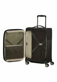 Valise à roulettes noire avec une poignée rétractable, intérieure beige, poche en mesh, sangles et doublure à motifs. Ouverte pour visibilité.