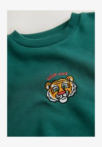 No seleccionado, green tiger print