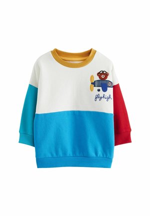 Bluza dziecięca z kolorowymi blokami w białym, niebieskim i czerwonym kolorze, żółtym kołnierzem oraz haftem misia pilota z napisem "fly high".