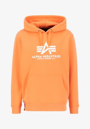 Pomarańczowa bluza z kapturem, z sznurkiem, przednią kieszenią i białym logo. Wykonana z miękkiego materiału, posiada ściągacze przy rękawach i hemie.