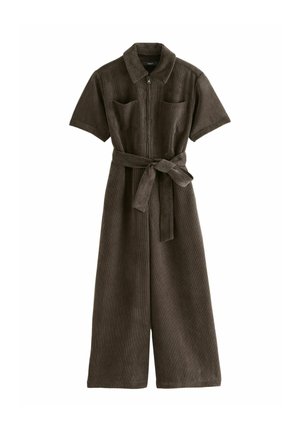 Brown corduroy jumpsuit with short sleeves, a zip front, two chest pockets, and a belt at the waist. Wide-legged design with textured fabric.