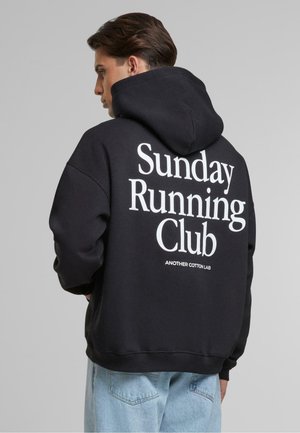Another Cotton Lab SUNDAY RUNNING CLUB OVERSIZED - Hoodie - black