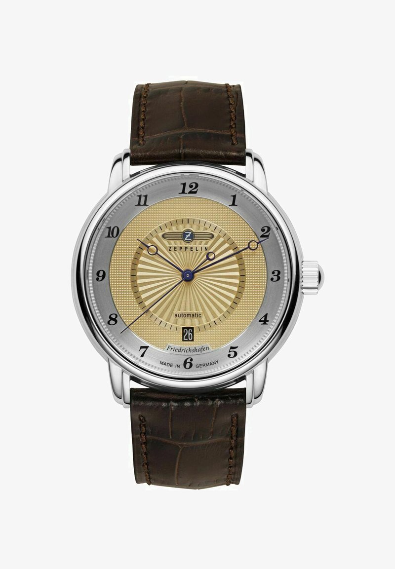 Zeppelin automatic watch with a silver stainless steel case, gold textured dial, blue hands, and brown leather strap. Date display at 6.