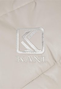 Karl Kani CROPPED PUFFER - Liemenė - light sand