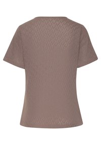 Kurzärmliges, taubefarbenes Oberteil mit einem strukturierten Rautenmuster, rundem Ausschnitt und lockerer Passform. Der Stoff scheint leicht und atmungsaktiv zu sein.