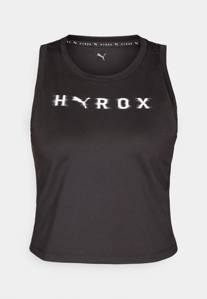 Top corto negro sin mangas hecho de tela suave, con un logotipo distorsionado en blanco de "HYROX" en la parte delantera y un escote redondeado.