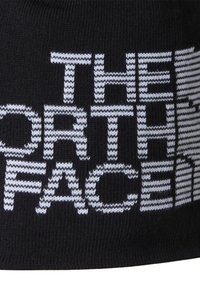 Berretto lavorato a maglia nero con logo bianco "THE NORTH FACE" in evidenza e design a righe. Texture morbida, vestibilità aderente, adatto per il clima freddo.