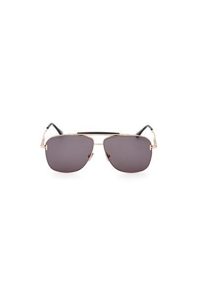 Metal frame sunglasses with a geometric shape, gold-toned hardware, dark gray lenses, and black accents on the temples.