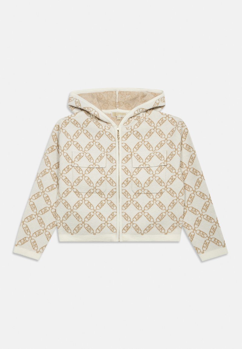 Krém színű kapucnis zipzáras dzseki, finom aranylánc mintával, két elülső zsebbel és puha textúrával. Kényelmes, laza fazon jellemzi.