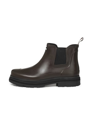 Bota chelsea de goma marrón con paneles laterales elásticos, puntera redondeada y suela negra gruesa. Cuenta con una pestaña en la parte posterior.