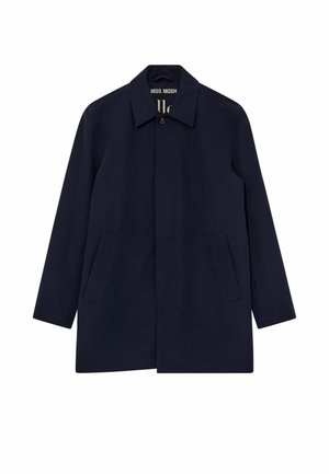 Nostatāns tumši zils vienrindu mētelis ar apkakli, slēptu pogu aizdari un divām slīpi izvietotām priekšējām kabatām.