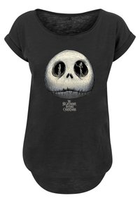 Melna T-kreklu ar izgriezumu un sarullētām piedurknēm. Uz tā ir liels Jack Skellington galvas un varoņu attēls no "Pirms Ziemassvētkiem".