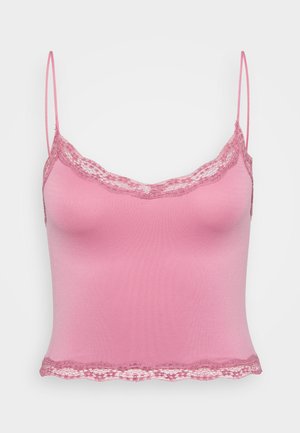 Roze camisole met dunne banden, voorzien van een kanten rand langs de halslijn en de zoom. Gemaakt van een gladde, rekbare stof.
