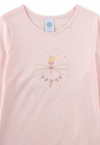 Light pink long-sleeve shirt featuring a printed fairy design with a crown, surrounded by small flowers and sparkles. Soft fabric texture.