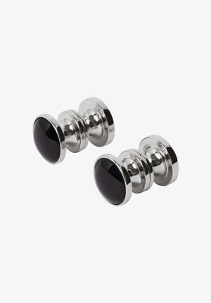 Paar runde Manschettenknöpfe aus poliertem silberfarbenem Metall mit schwarzer Emaille-Einlage. Sie zeichnen sich durch eine glatte, glänzende Oberfläche und ein klassisches, elegantes Design aus.
