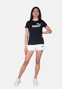 Puma AMPLIFIED - Triko s potiskem - nero